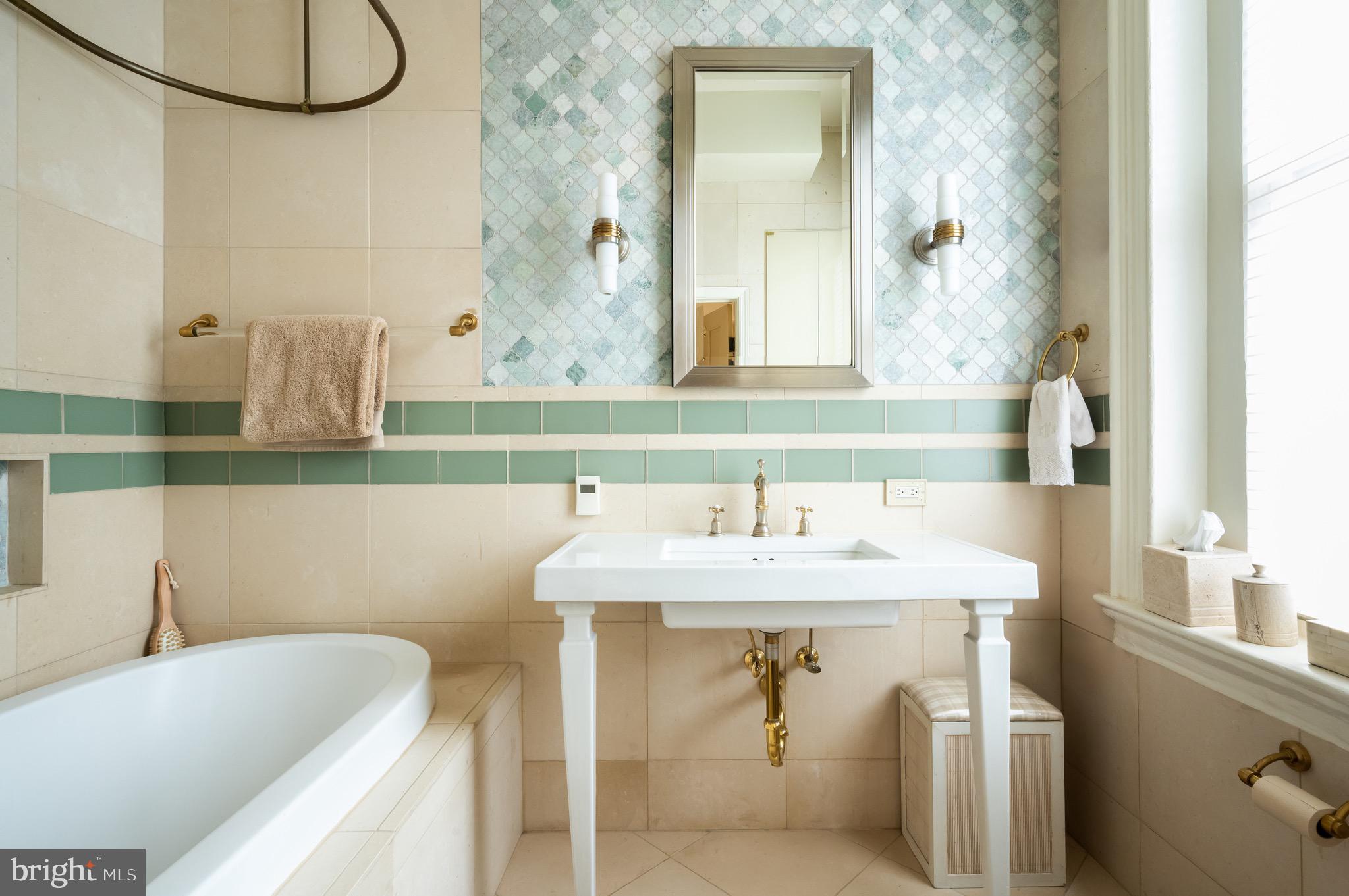 1335 Vermont Avenue Northwest Washington, DC 20005 - Photo 27 of 47 a bathroom with a sink and a mirror
