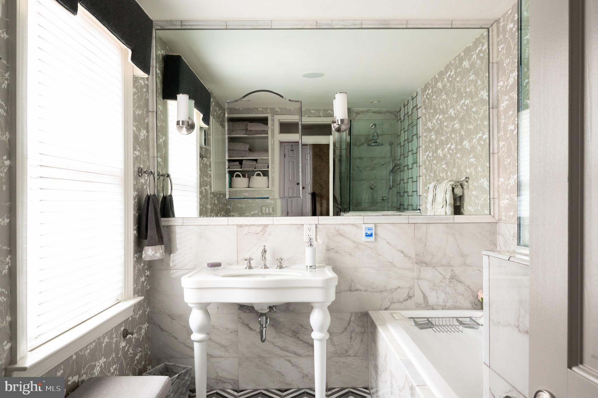 1335 Vermont Avenue Northwest Washington, DC 20005 - Photo 31 of 47 a bathroom with a bathtub and a sink