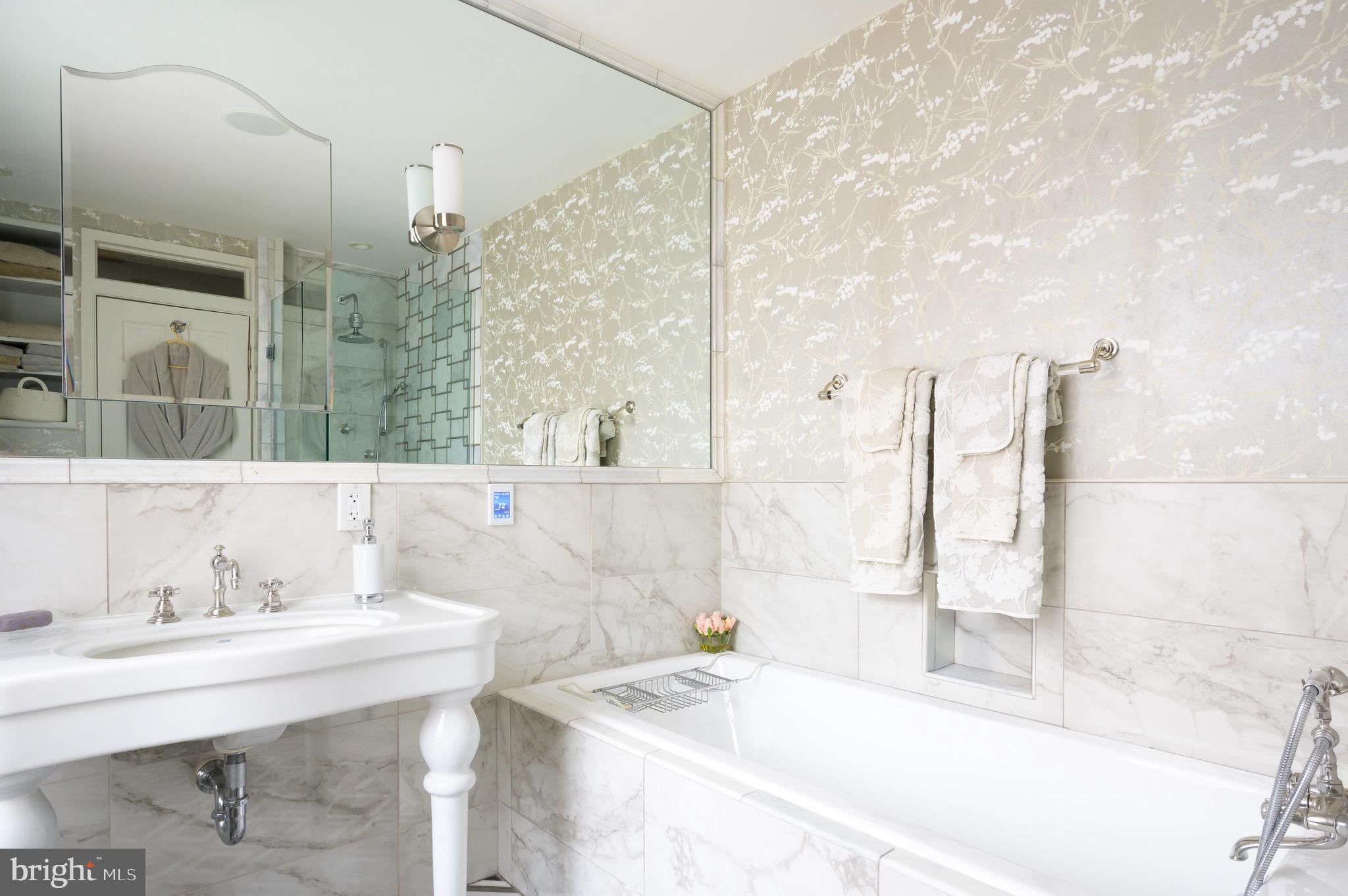 1335 Vermont Avenue Northwest Washington, DC 20005 - Photo 32 of 47 a bathroom with a bathtub and a sink