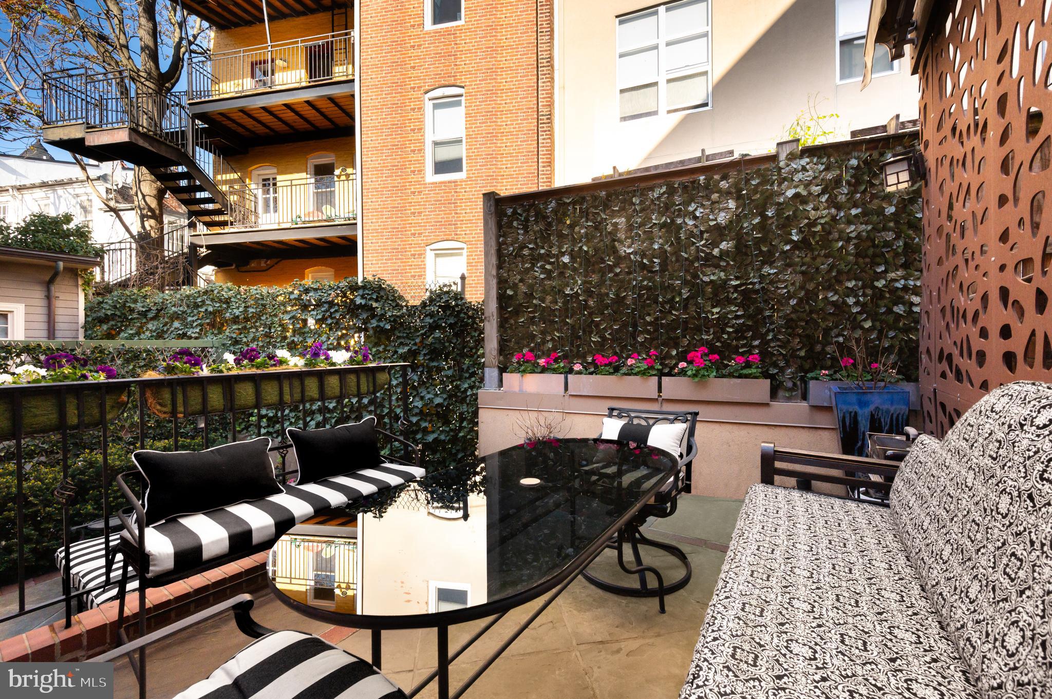 1335 Vermont Avenue Northwest Washington, DC 20005 - Photo 44 of 47 a view of a chairs and tables in the patio