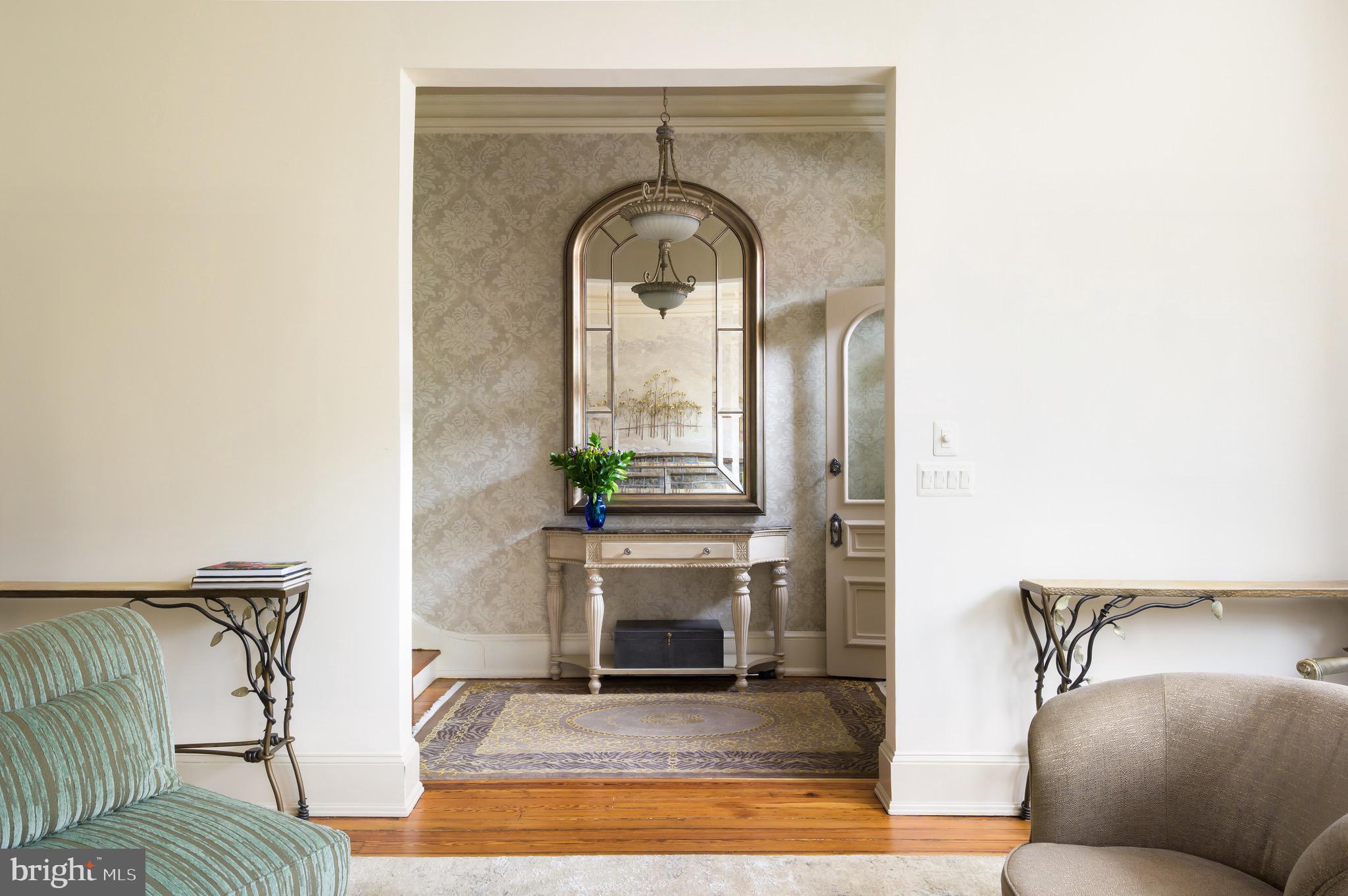 1335 Vermont Avenue Northwest Washington, DC 20005 - Photo 7 of 47 a living room with furniture and a fireplace