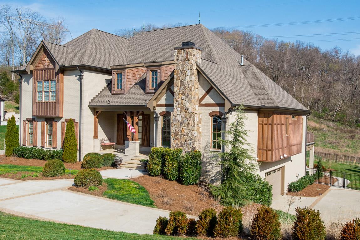 641 Legends Crest Drive Franklin, TN 37069 - Photo 2 of 30 a front view of a house with garden