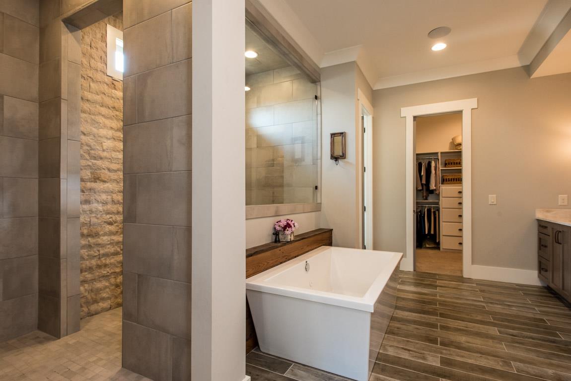 641 Legends Crest Drive Franklin, TN 37069 - Photo 17 of 30 a bathroom with a bathtub and a shower