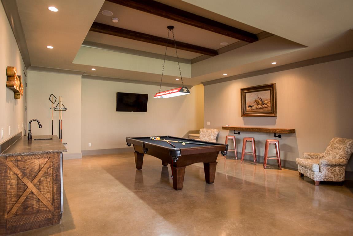 641 Legends Crest Drive Franklin, TN 37069 - Photo 25 of 30 a living room with patio furniture and a flat screen tv