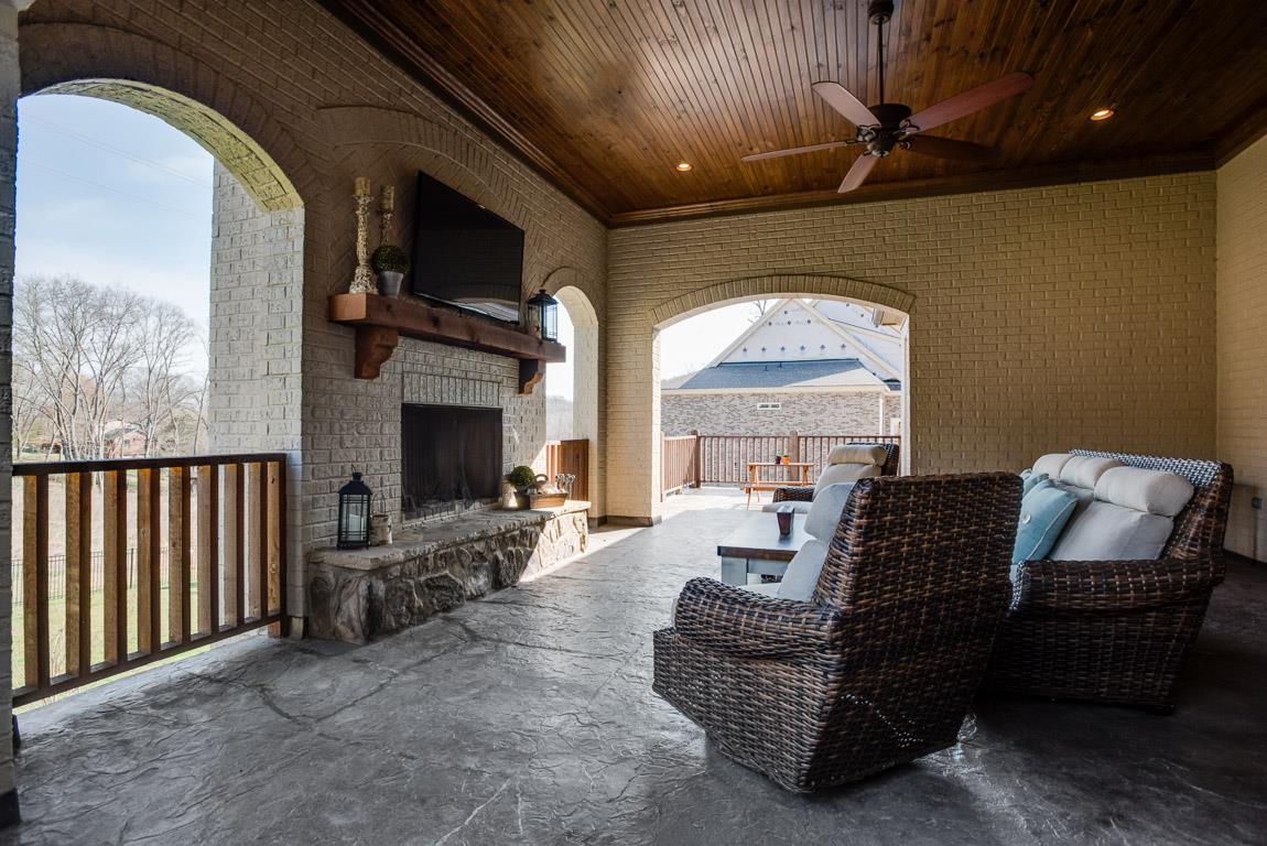 641 Legends Crest Drive Franklin, TN 37069 - Photo 28 of 30 a living room with furniture and a fireplace