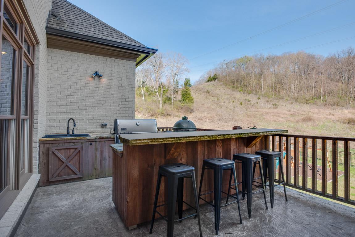 641 Legends Crest Drive Franklin, TN 37069 - Photo 29 of 30 a view of a chairs and table in the terrace