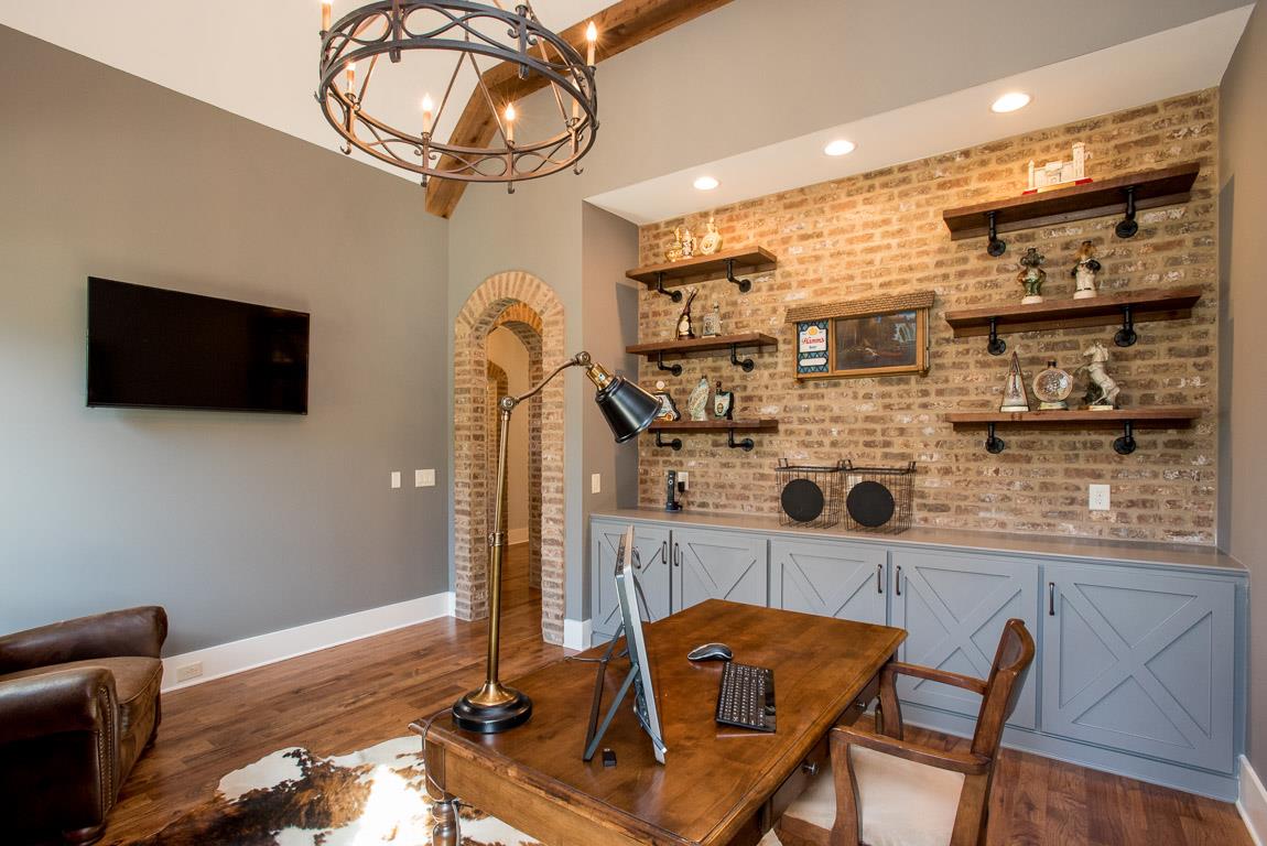641 Legends Crest Drive Franklin, TN 37069 - Photo 10 of 30 a dining room with furniture and a flat screen tv