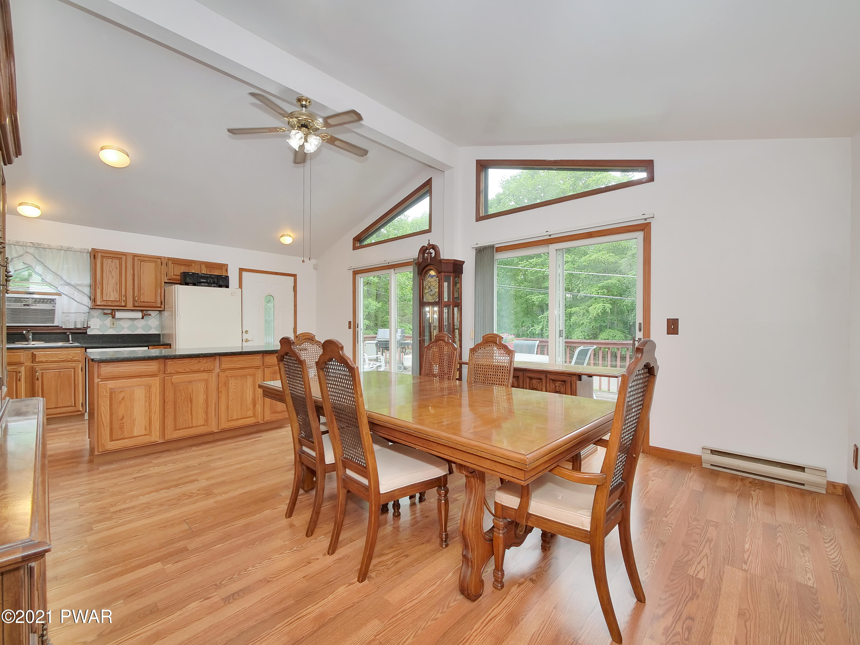 149 Yale Road Milford, PA 18337 - Photo 15 of 29 a dining room with furniture and wooden floor