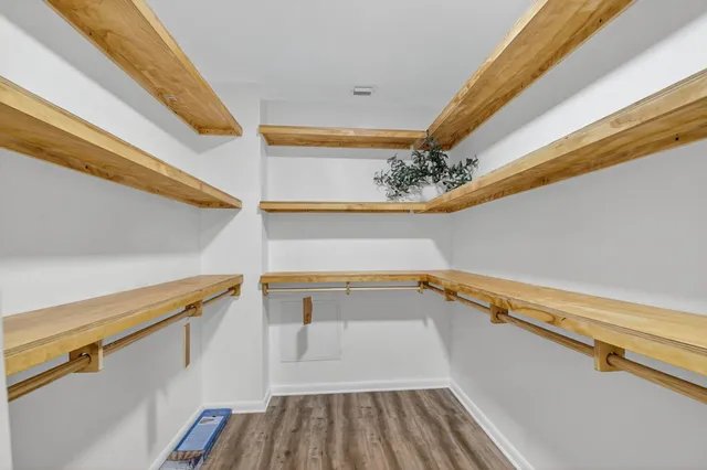 a view of a room with racks on the wall