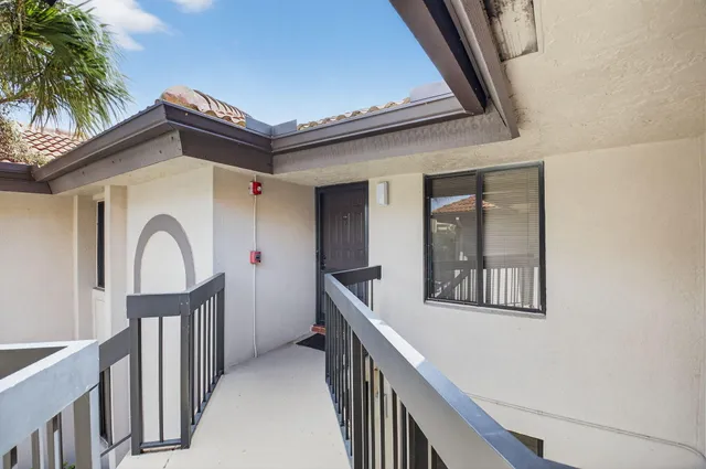 a view of a hallway with a entryway