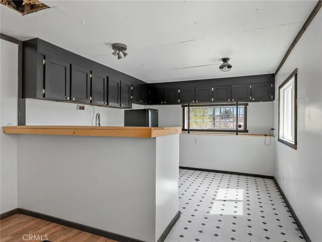 a bathroom with a toilet sink and shower