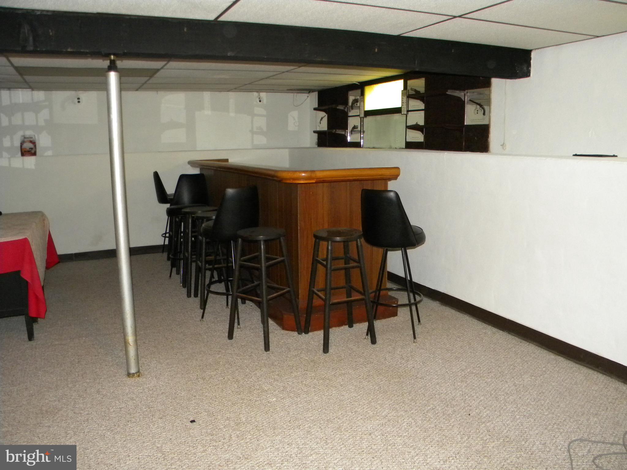 930 Kinwat Avenue Baltimore, MD 21221 - Photo 24 of 30 Basement comes w/ bar