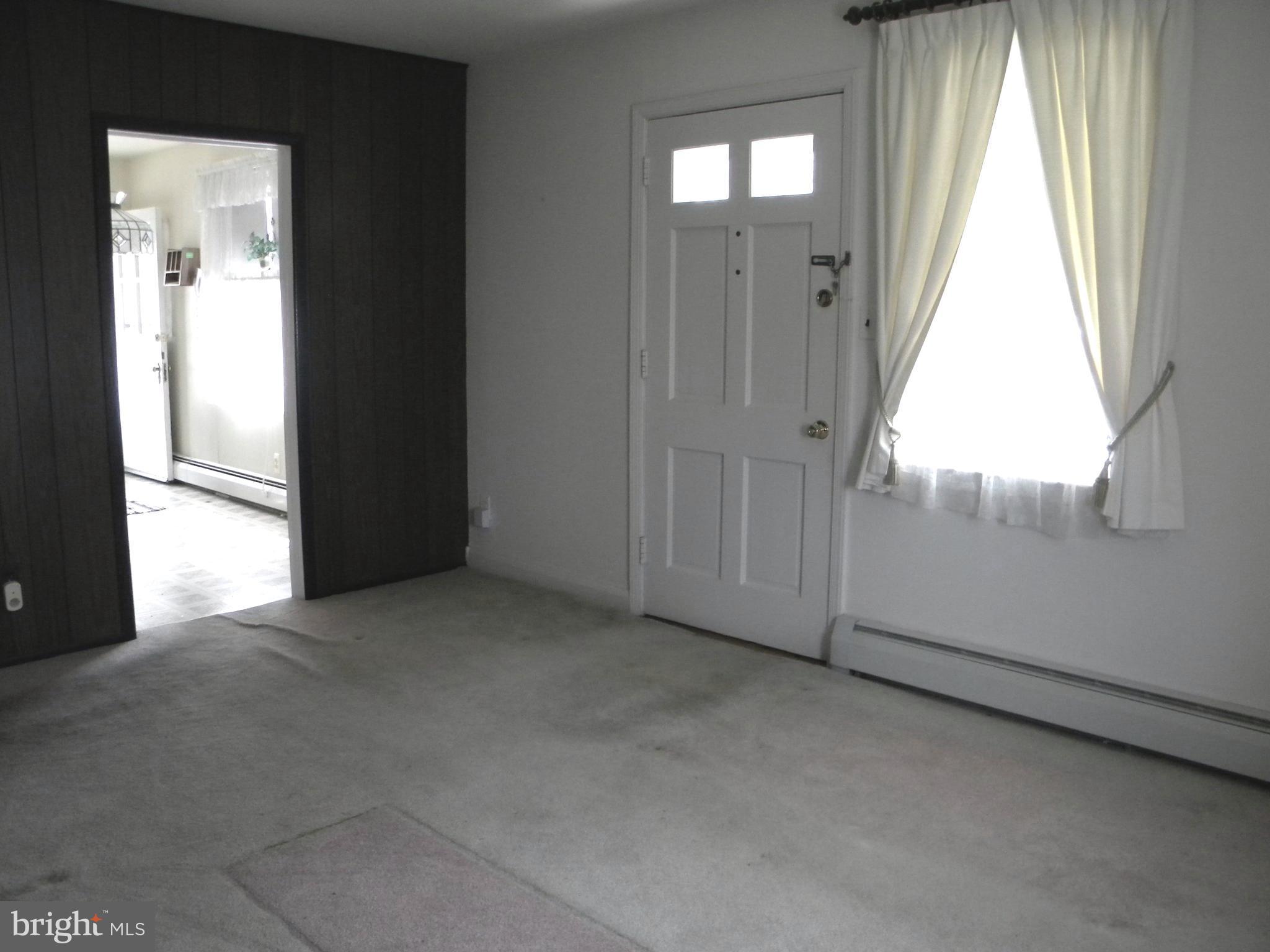 930 Kinwat Avenue Baltimore, MD 21221 - Photo 6 of 30 New flooring and paint would make this complete