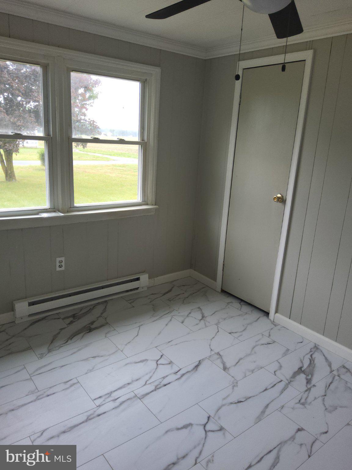 4212 Railroad Road Hurlock, MD 21643 - Photo 4 of 8 Bright and airy room with modern flair.