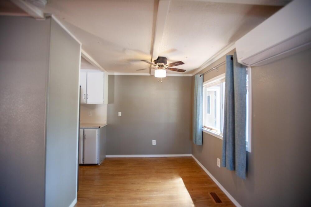 4778 North River Road Gold Hill, OR 97525 - Photo 14 of 15 an empty room with windows and fan
