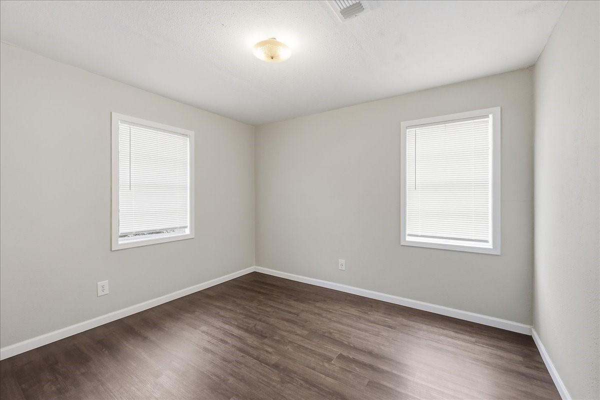 1415 Beagle Road Orange, TX 77632 - Photo 14 of 23 an empty room with a window