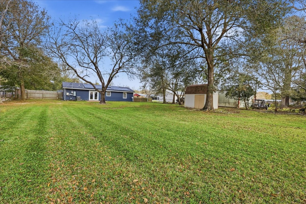 1415 Beagle Road Orange, TX 77632 - Photo 20 of 23 a view of a field with tree s