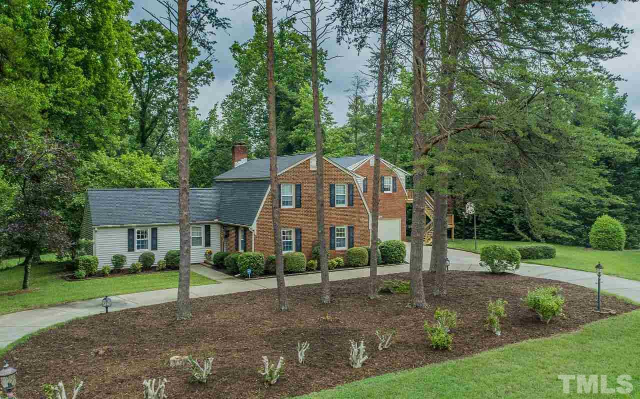 10 Canterbury Drive Roxboro, NC 27573 - Photo 14 of 30 a view of a house with a yard