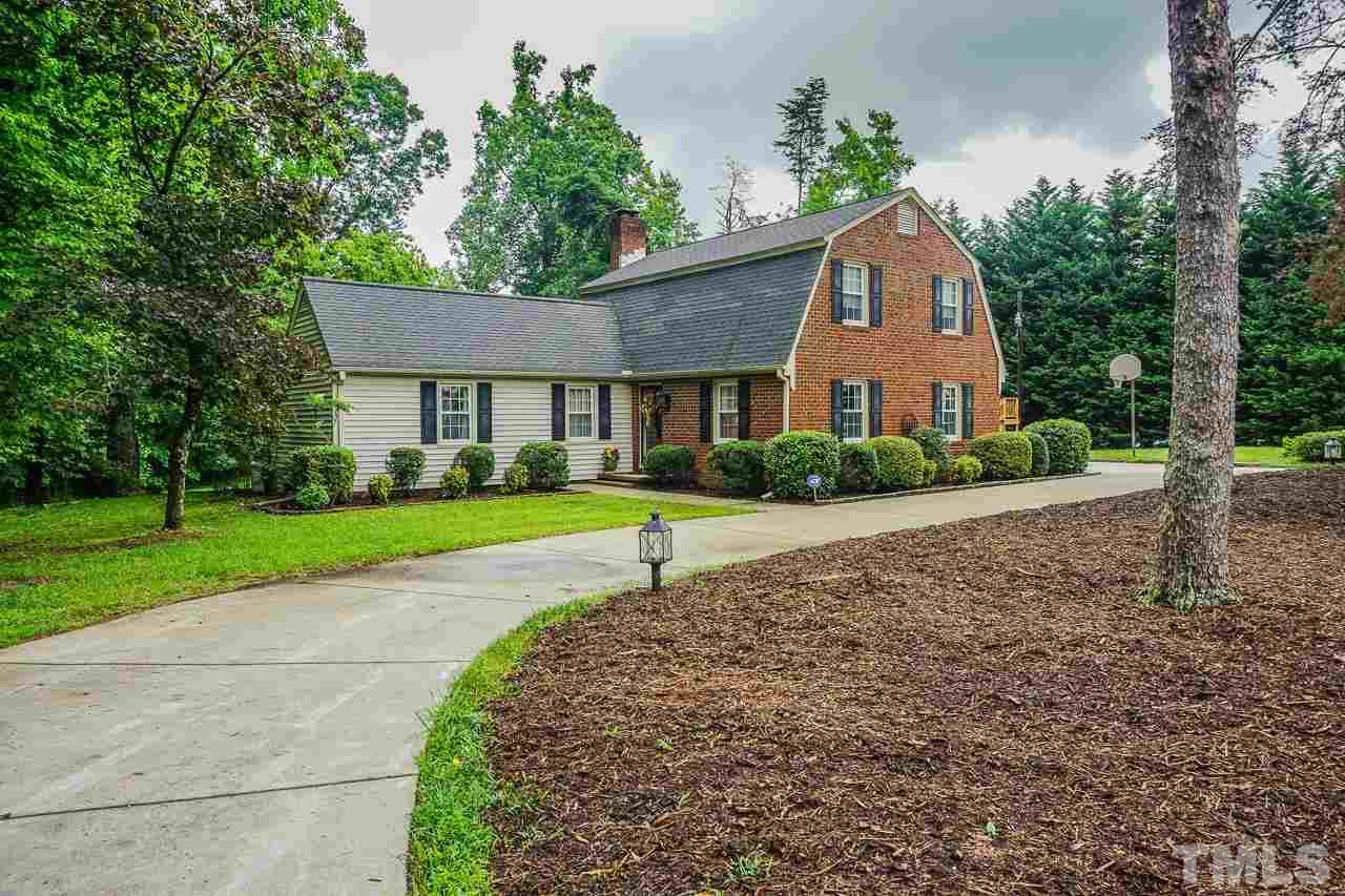10 Canterbury Drive Roxboro, NC 27573 - Photo 19 of 30 a house view with a garden space