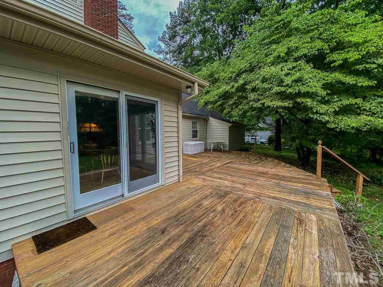 10 Canterbury Drive Roxboro, NC 27573 - Photo 21 of 30 a house with trees in the background