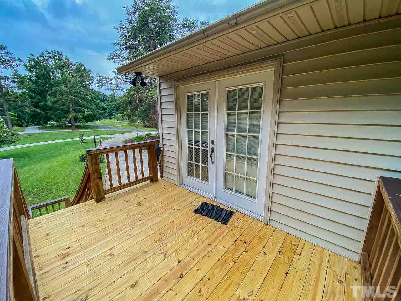 10 Canterbury Drive Roxboro, NC 27573 - Photo 27 of 30 a view of backyard with a garden