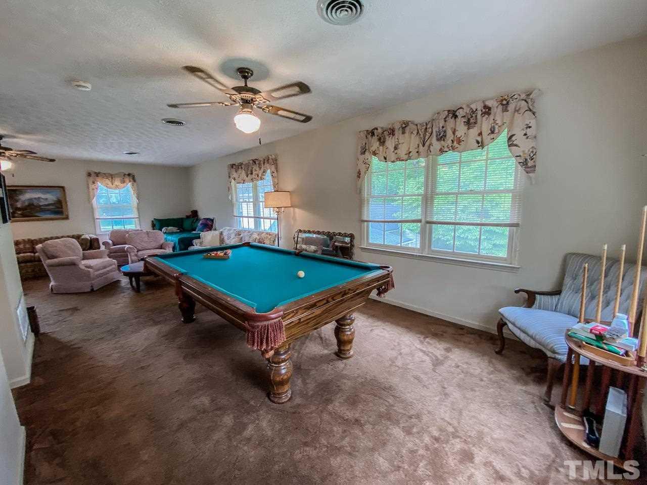 10 Canterbury Drive Roxboro, NC 27573 - Photo 29 of 30 a living room with furniture and a large window