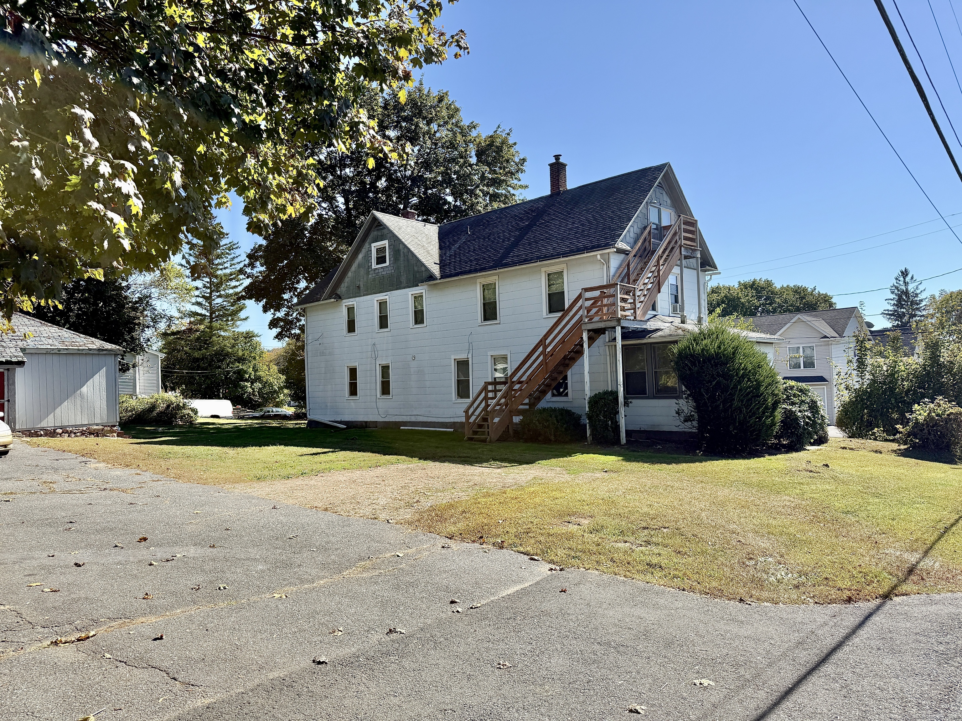 69 Johnson Street Naugatuck, CT 06770 - Photo 1 of 1 a view of a house with a yard