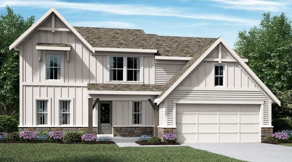 200 Greenbrier Way Canton, GA 30114 - Photo 1 of 1 a front view of a house with a yard and garage