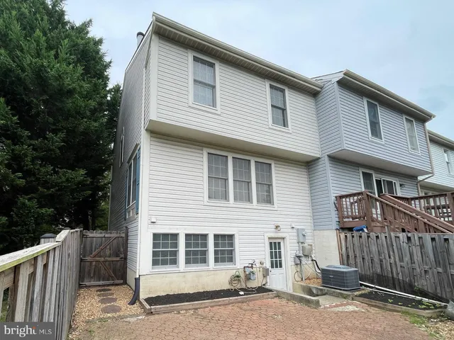 a front view of a house with a garage