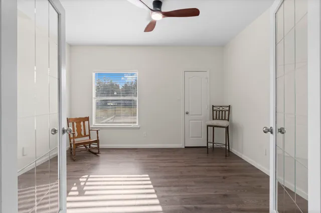 a view of a house with a yard and a swimming pool