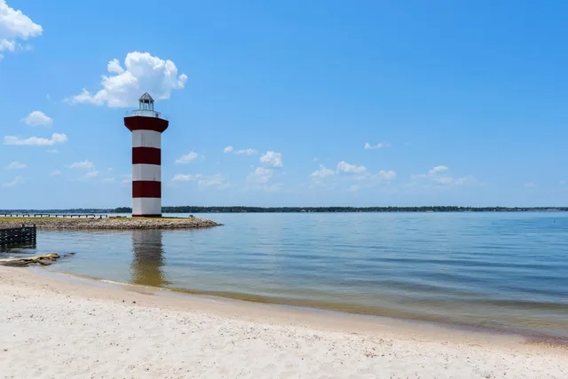 a view of a hall with a cabinet