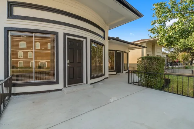 a view of a door and a window