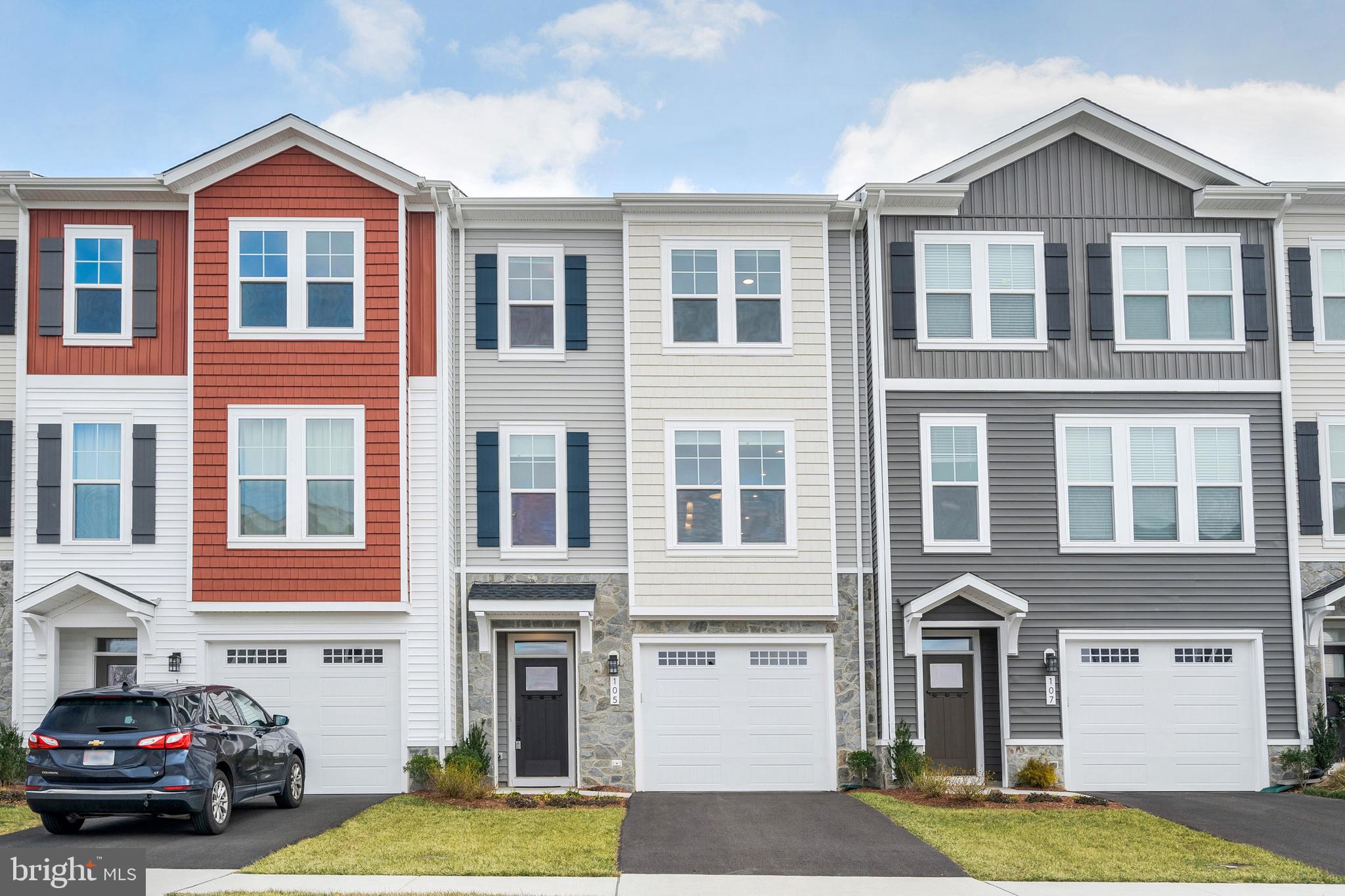 105 Checkerspot Way White Post, VA 22663 - Photo 1 of 37 a front view of a residential apartment building with a yard
