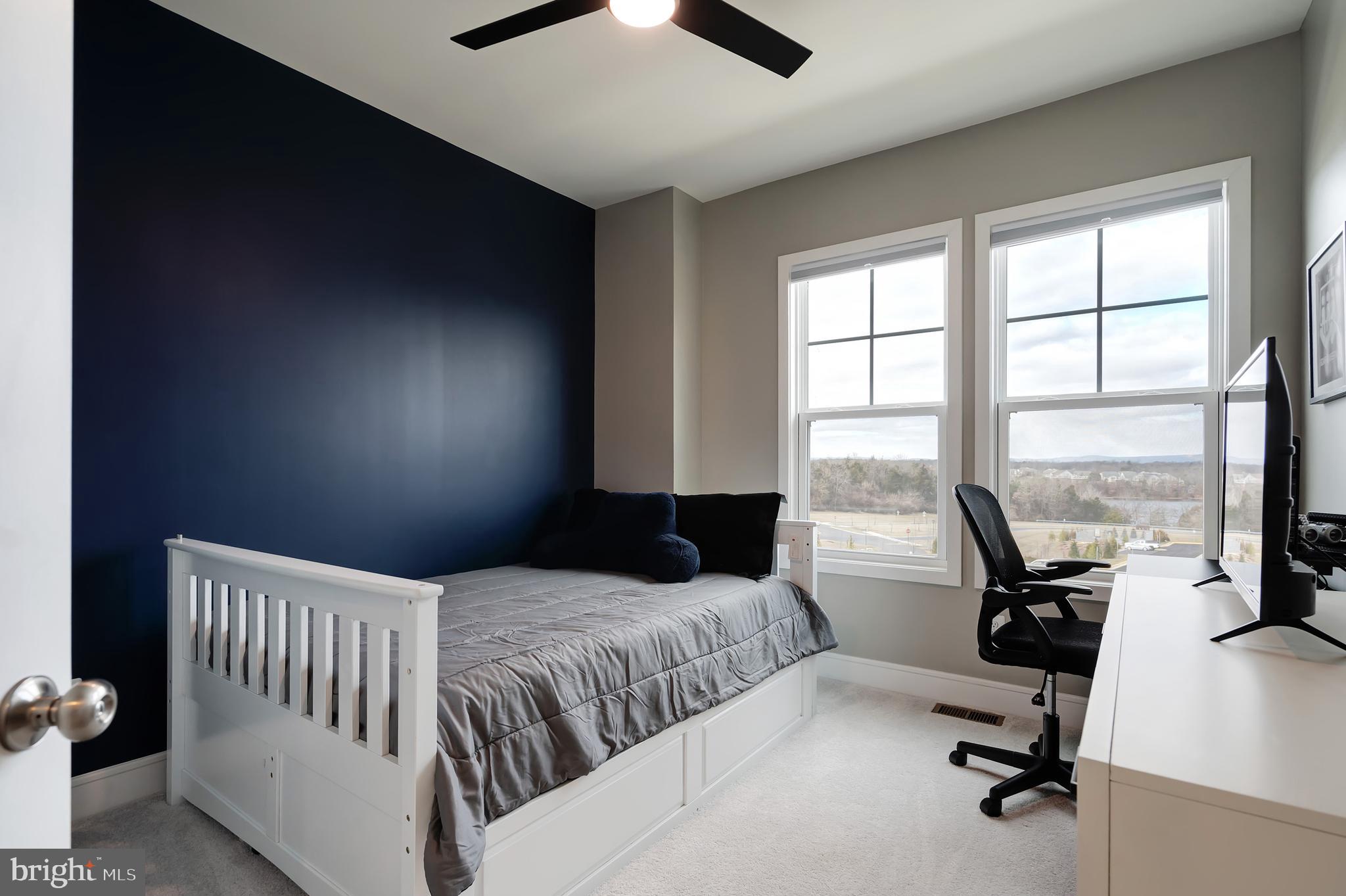 105 Checkerspot Way White Post, VA 22663 - Photo 29 of 37 a bedroom with a bed and a large window