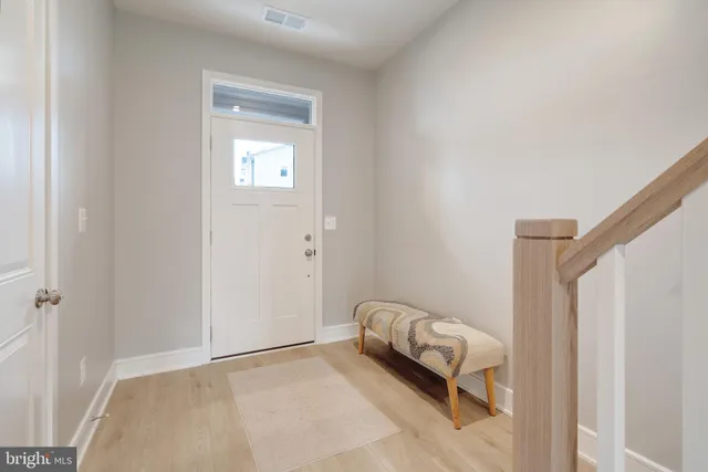 a room with a bed and a window