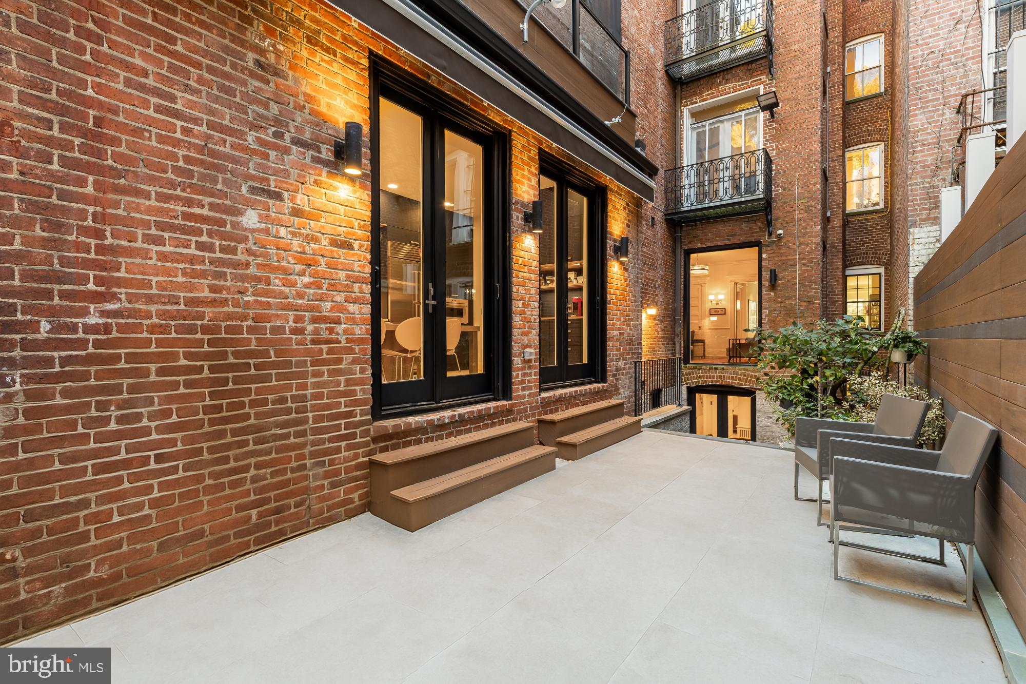 2137 R Street Northwest Washington, DC 20008 - Photo 19 of 41 a view of patio with a table and chairs and potted plants