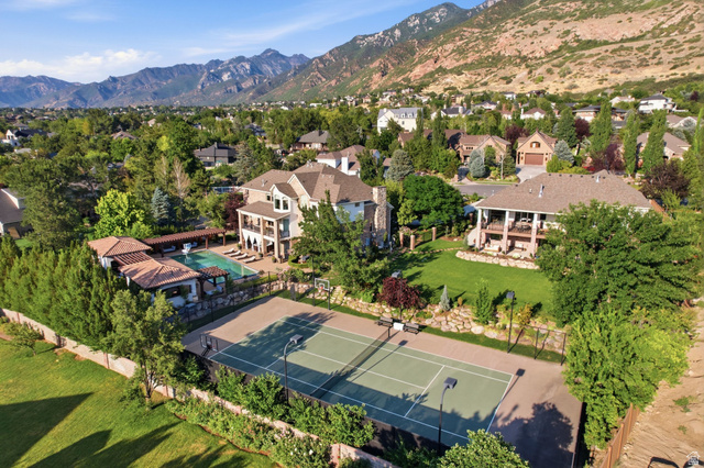 12308 Mariah Circle Draper, UT 84020 - Photo 7 of 293 Expansive estate with 2 separate homes featuring a private tennis court, infinity swimming pool, and landscaped grounds