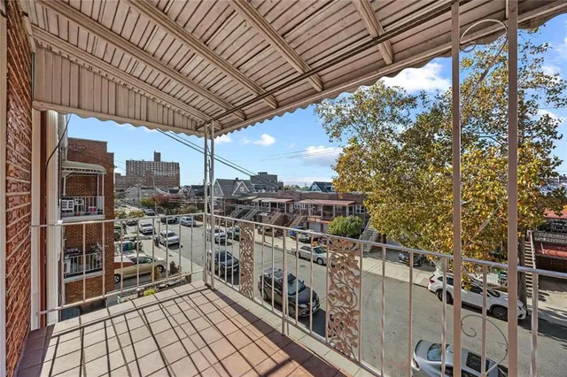 a view of a balcony with city view