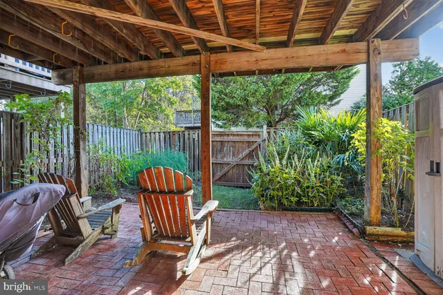 a garden view with a seating space