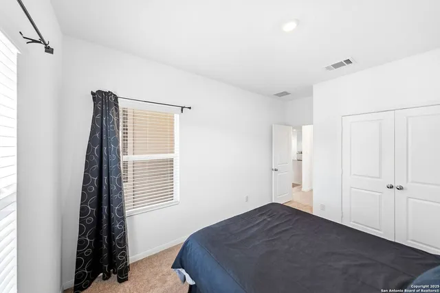 a view of a livingroom with wooden floor