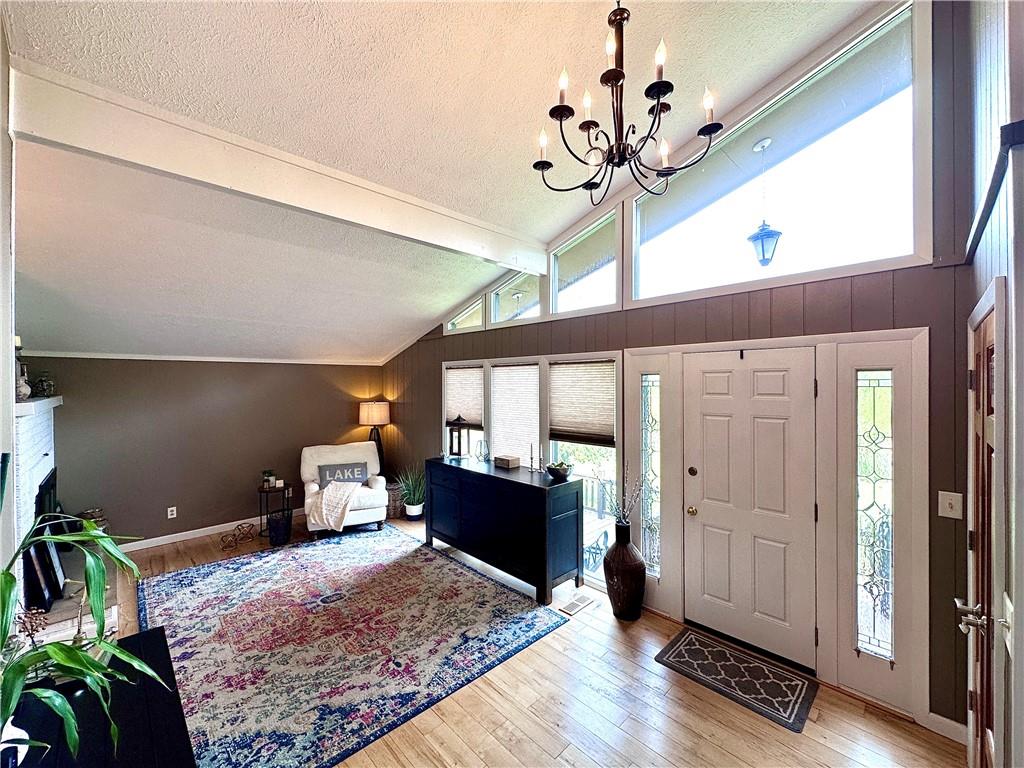 927 Chippewa Trail Mercer, PA 16137 - Photo 15 of 48 a living room with furniture and a chandelier