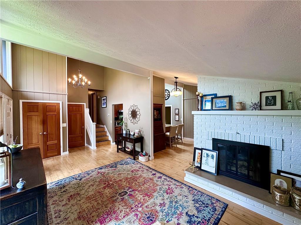 927 Chippewa Trail Mercer, PA 16137 - Photo 19 of 48 a living room with furniture and a fireplace
