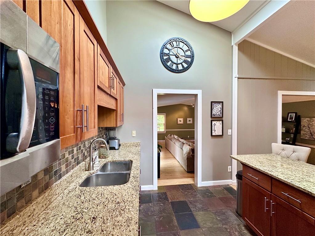 927 Chippewa Trail Mercer, PA 16137 - Photo 24 of 48 a view of a kitchen with a sink and a refrigerator