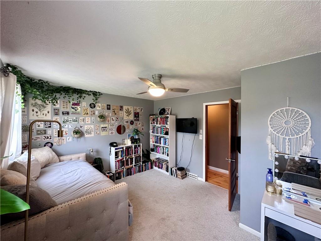 927 Chippewa Trail Mercer, PA 16137 - Photo 42 of 48 a bedroom with furniture and a flat screen tv