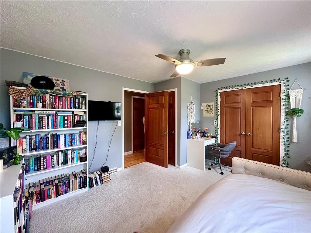 927 Chippewa Trail Mercer, PA 16137 - Photo 44 of 48 a bedroom with furniture and a book shelf