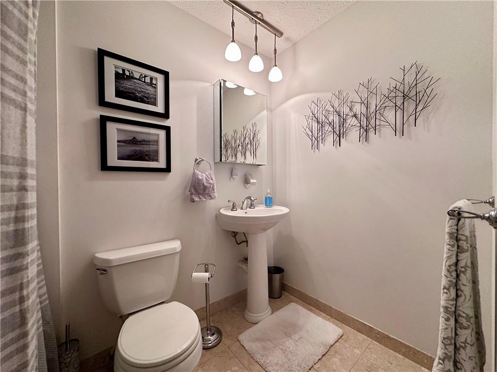 927 Chippewa Trail Mercer, PA 16137 - Photo 45 of 48 a bathroom with a toilet a sink and mirror