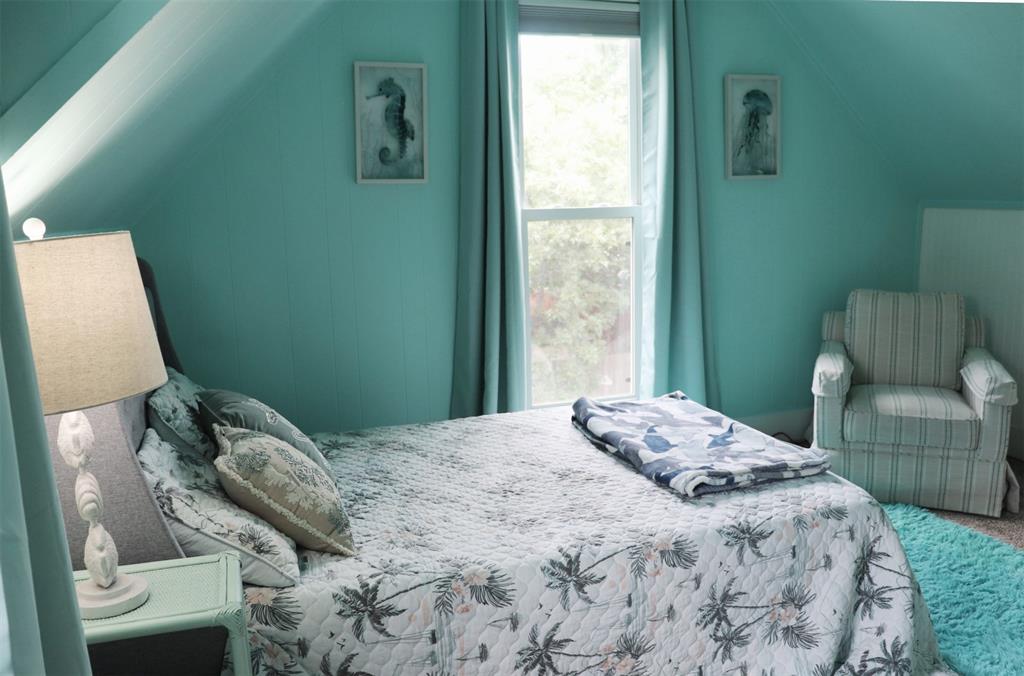 201 Shaffner Street Ponder, TX 76259 - Photo 35 of 40 a bedroom with a bed and a window