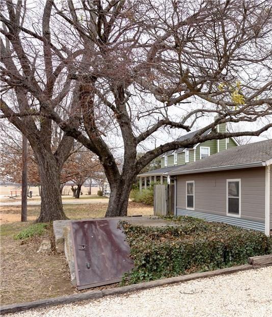 201 Shaffner Street Ponder, TX 76259 - Photo 4 of 40 a front view of a house with tree s