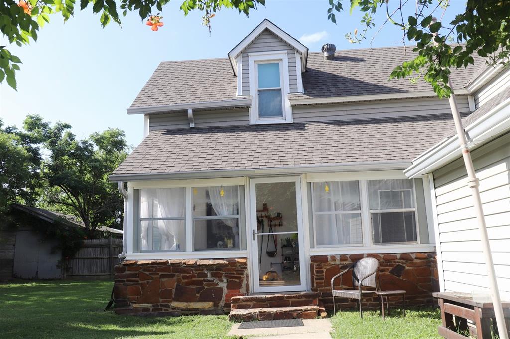 201 Shaffner Street Ponder, TX 76259 - Photo 9 of 40 a view of house with a yard