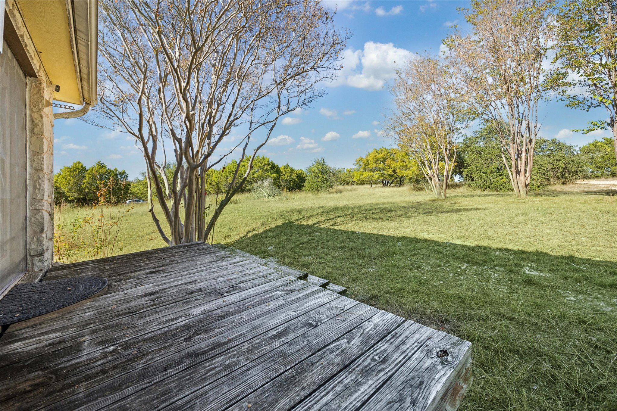 1091 Alta Vista Road Spicewood, TX 78669 - Photo 27 of 28 a view of a backyard
